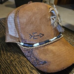 Brown Feathered Trucker Hat with Hand Burned Design